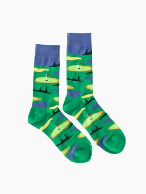 A pair of men's golf - themed socks with green backgrounds, featuring illustrations of golf courses, flags, and tees.