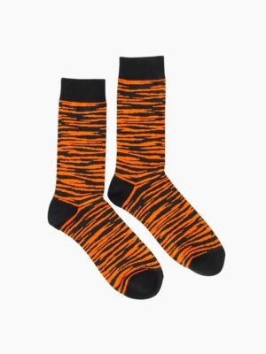 A pair of black and orange striped socks with a bold, leopard - inspired pattern.