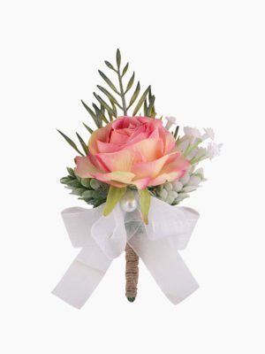 Ombre pink rose boutonniere with green foliage, white ribbon and pearl accent
