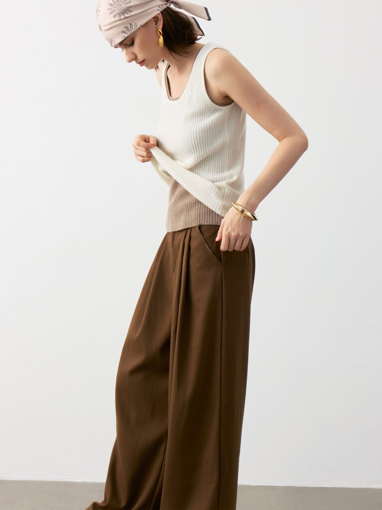 Model Wearing Pure Cashmere U-Neck Ribbed Camisole in Ivory White & Taupe Brown with Brown Wide-Leg Pants and Headscarf