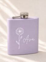 Light purple personalized birth flower flask with floral line art and the name Ava
